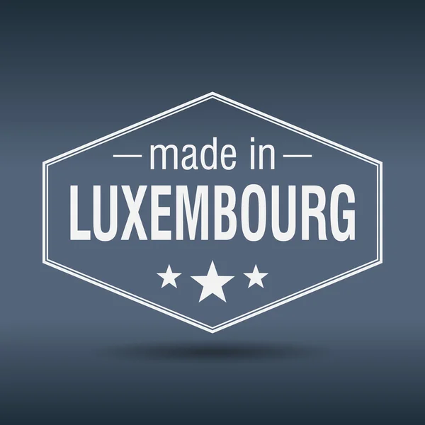 Made in Luxembourg hexagonal white vintage label — Stock Vector