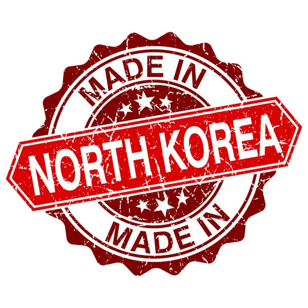 Gemaakt in Noord-Korea rode stempel geïsoleerd op witte achtergrond — Stockvector