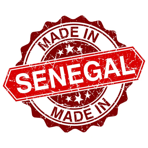 Fabriqué au Sénégal timbre rouge isolé sur fond blanc — Image vectorielle