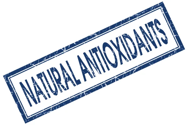 Beyaz arka plan üzerinde izole doğal antioksidanlar mavi kare pul — Stok fotoğraf