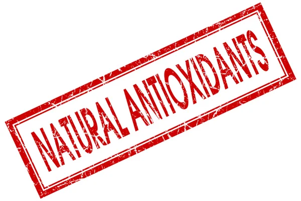 Antioxidantes naturais carimbo quadrado vermelho isolado sobre fundo branco — Fotografia de Stock