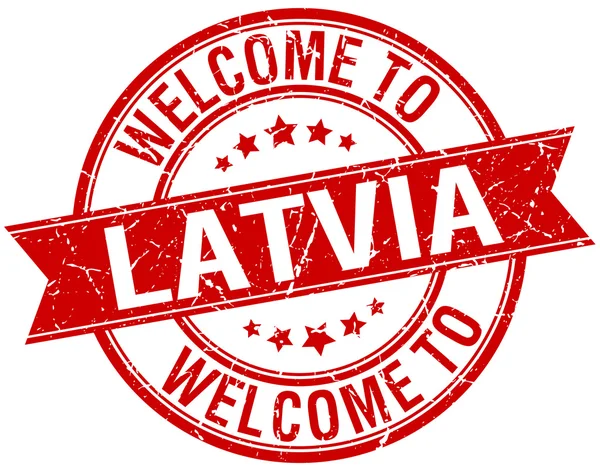 Welcome to Latvia red round ribbon stamp — Stock Vector