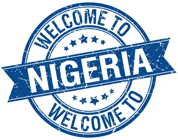 Benvenuto a Nigeria timbro nastro rotondo blu — Vettoriale Stock