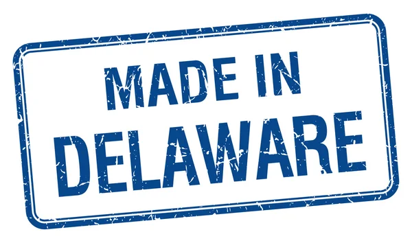 Fabriqué en Delaware bleu carré timbre isolé — Image vectorielle