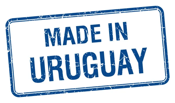 Fabriqué en Uruguay carré bleu timbre isolé — Image vectorielle