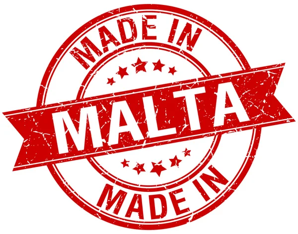 Vyrobené v Maltě červené kulaté razítko vintage — Stockový vektor