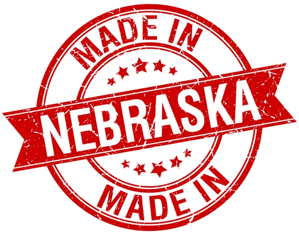 Fabriqué au Nebraska timbre vintage rond rouge — Image vectorielle