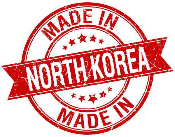 Hergestellt in Nordkorea rote runde Vintage-Marke — Stockvektor