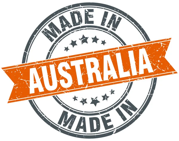 Australia orange grunge ribbon stamp on white — Stock Vector