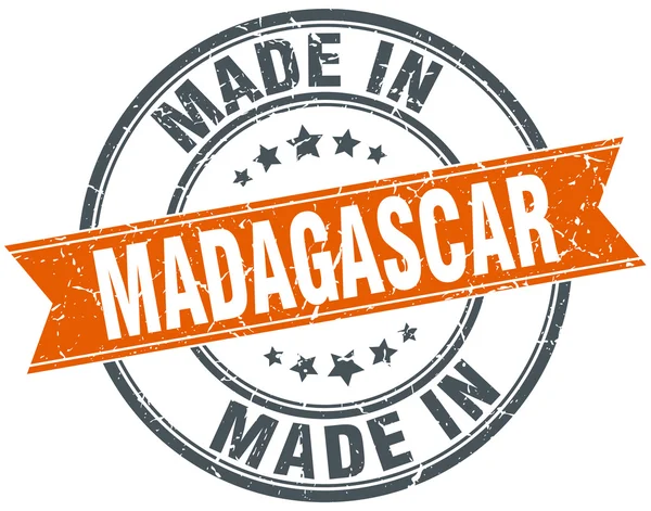 Madagaskar turuncu grunge şerit damgası beyaz — Stok Vektör