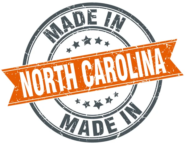 North Carolina pomarańczowy tło wstążka pieczęć na biały — Wektor stockowy