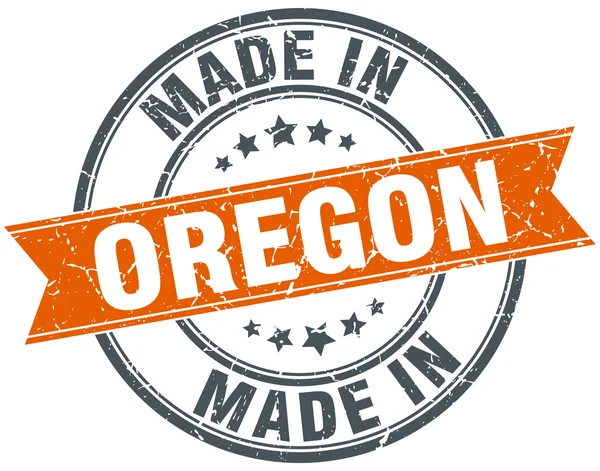 Oregon orange grunge ribbon stamp on white — Stock Vector