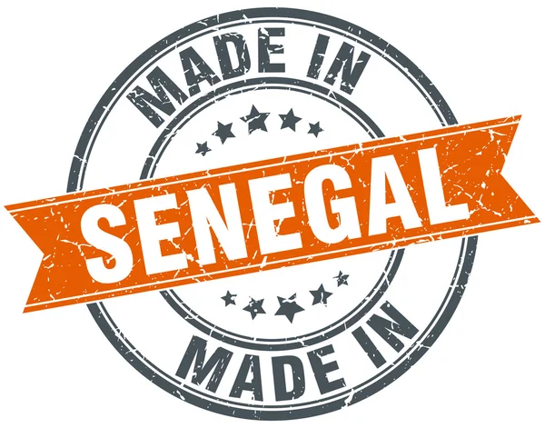 Ruban grunge orange Sénégal timbre sur blanc — Image vectorielle
