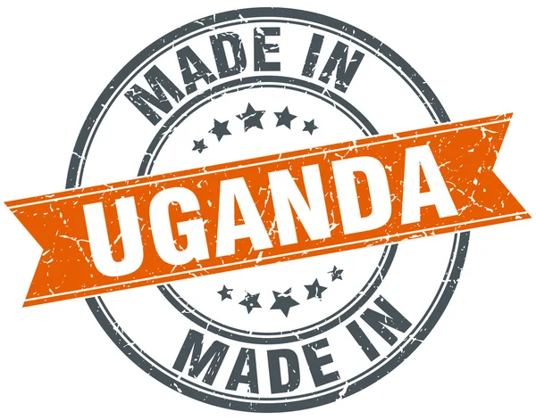 Uganda orange grunge ribbon stamp auf weiß — Stockvektor