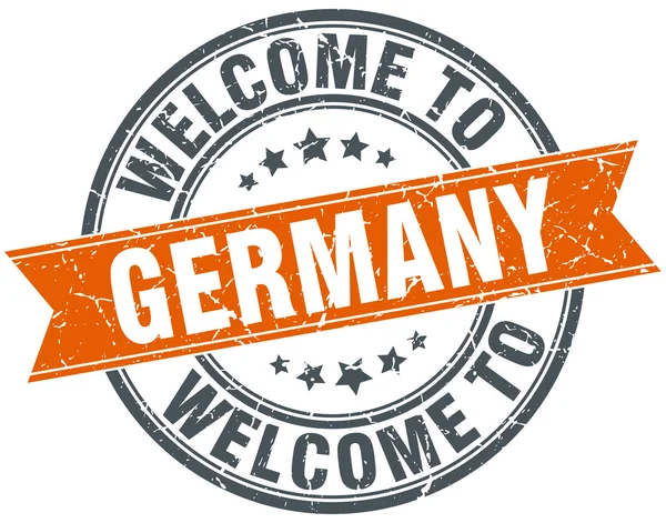 Benvenuto in Germania arancio timbro nastro rotondo — Vettoriale Stock