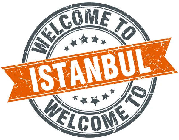 Benvenuto a Istanbul arancione nastro rotondo timbro — Vettoriale Stock