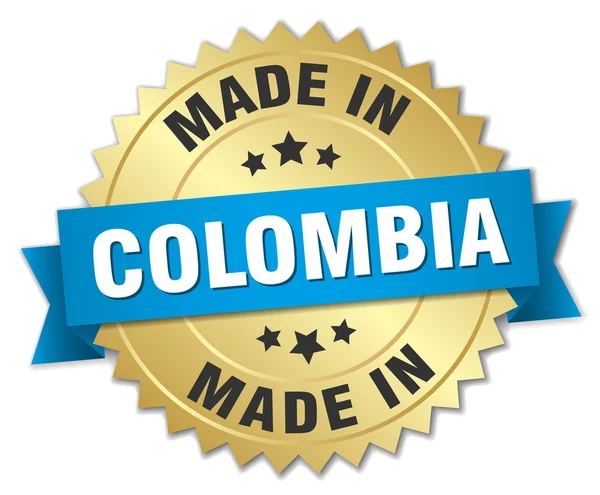 Hecho en Colombia insignia de oro con cinta azul — Archivo Imágenes Vectoriales