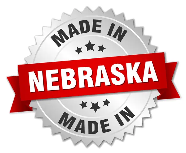 Made in Nebraska silver badge with red ribbon — Stock Vector