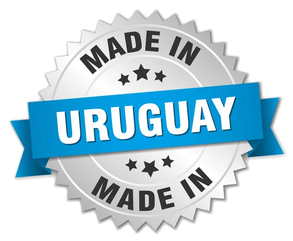 Hecho en Uruguay placa de plata con cinta azul — Archivo Imágenes Vectoriales