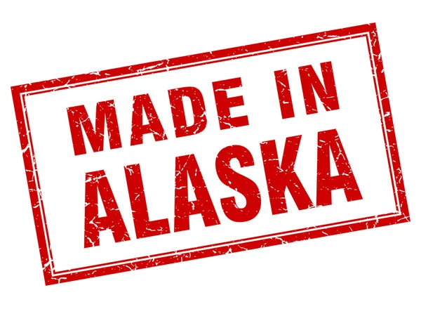 Grunge quadrado vermelho do Alasca feito em selo — Vetor de Stock