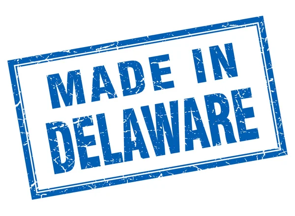 Grunge carrée bleue Delaware fabriquée en timbre — Image vectorielle