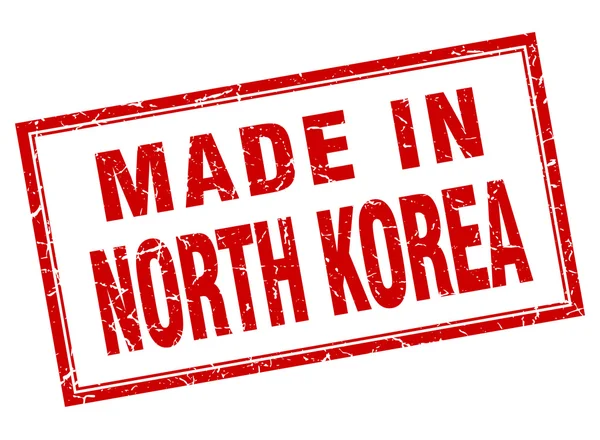 Corea del Nord grunge quadrato rosso fatto in francobollo — Vettoriale Stock