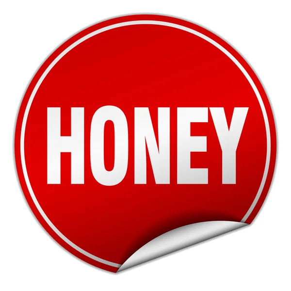 Etiqueta engomada roja redonda de miel aislada en blanco — Vector de stock