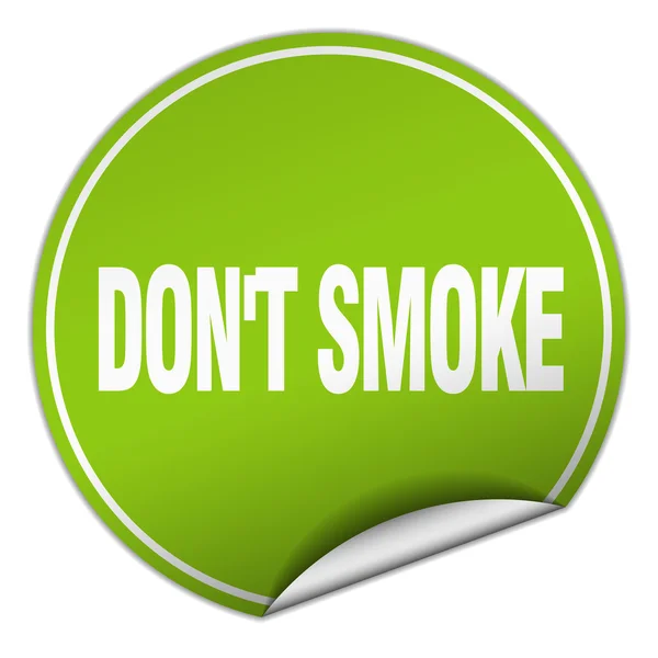 Don 't smoke round green sticker isolated on white — стоковый вектор