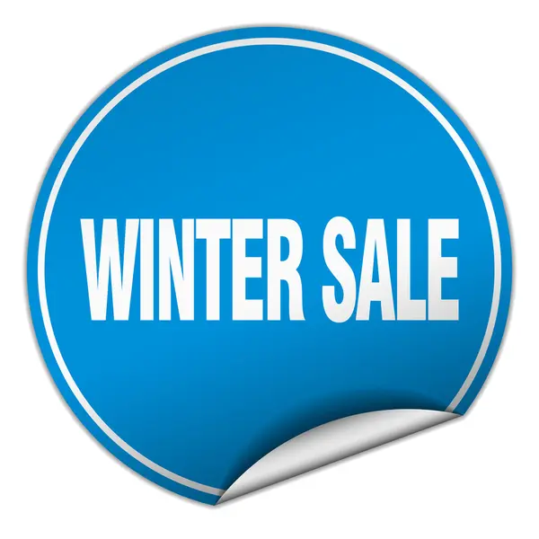 Inverno vendita rotondo adesivo blu isolato su bianco — Vettoriale Stock