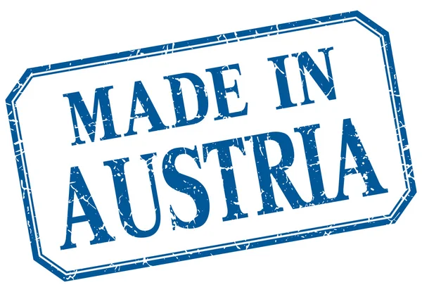 Autriche - fabriqué en étiquette isolée vintage bleue — Image vectorielle