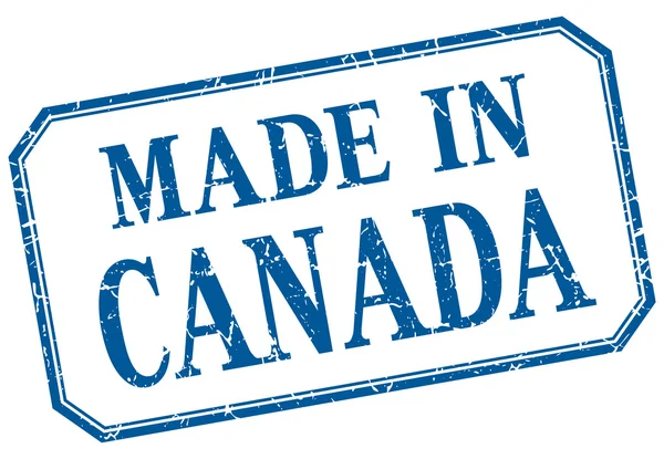 Kanada - mavi vintage izole etiketinde yapılan — Stok Vektör