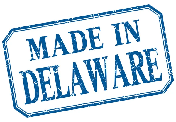 Delaware - fabriqué en étiquette isolée vintage bleue — Image vectorielle