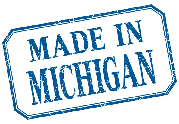 Michigan - hecho en etiqueta aislada vintage azul — Archivo Imágenes Vectoriales