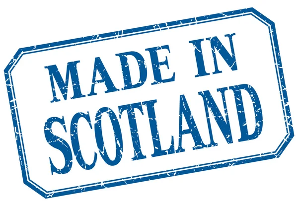 Escocia - hecho en etiqueta aislada vintage azul — Vector de stock