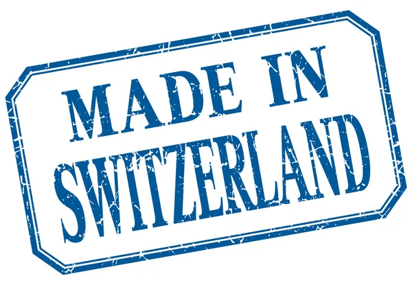 Suiza - hecho en etiqueta aislada vintage azul — Archivo Imágenes Vectoriales