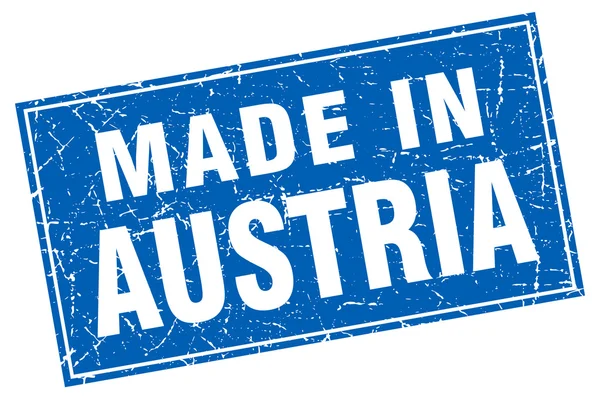 Grunge carré bleu Autriche fabriquée en timbre — Image vectorielle