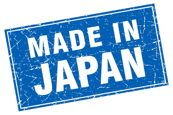 Giappone grunge quadrato blu fatto in francobollo — Vettoriale Stock