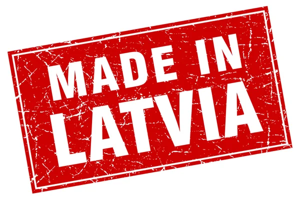 Grunge carré rouge letton fabriqué en timbre — Image vectorielle