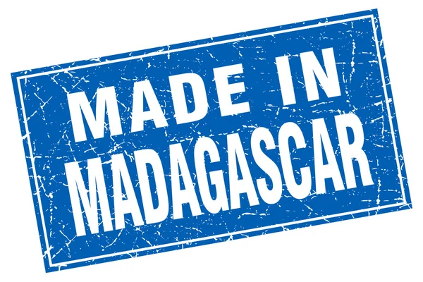 Madagáscar grunge quadrado azul feito em carimbo — Vetor de Stock