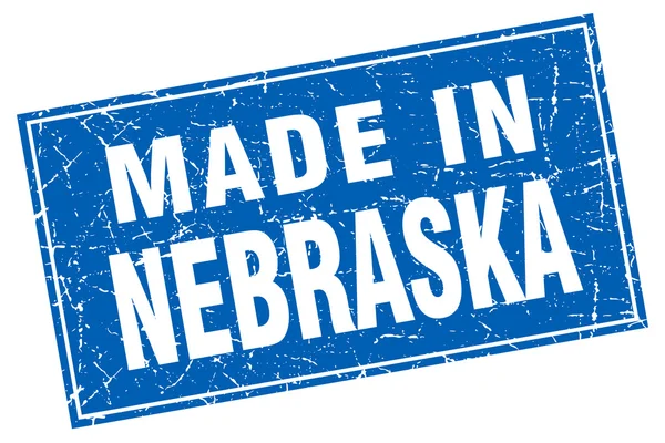 Grunge cuadrado azul Nebraska hecho en sello — Archivo Imágenes Vectoriales