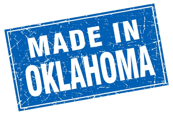 Grunge carré bleu Oklahoma fabriqué en timbre — Image vectorielle