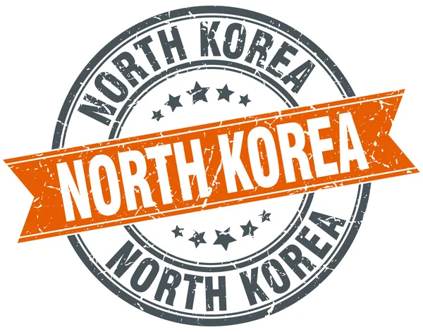 North Korea red round grunge vintage ribbon stamp — Stock Vector