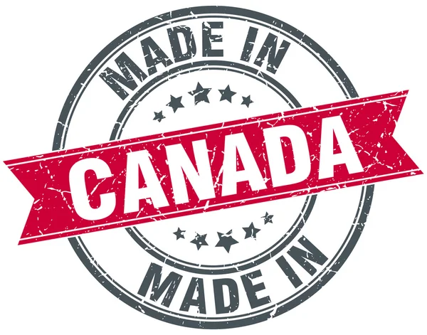 Hecho en Canadá sello vintage redondo rojo — Vector de stock