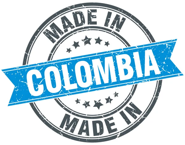 Fabriqué en Colombie timbre vintage rond bleu — Image vectorielle