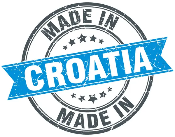 Gjort i Kroatien blå runda vintage stämpel — Stock vektor