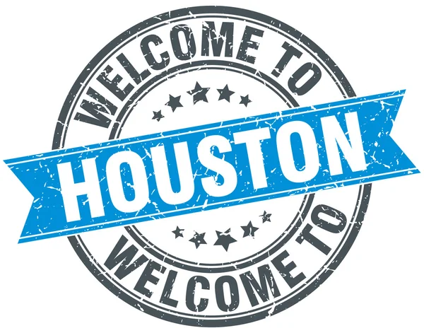 Benvenuto a Houston blu rotondo timbro vintage — Vettoriale Stock