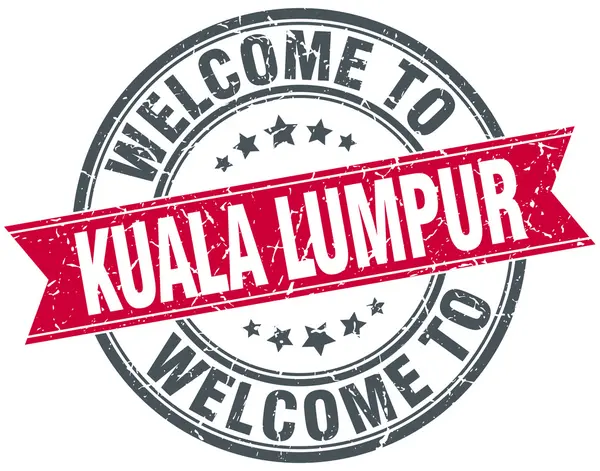 Benvenuto a Kuala Lumpur rosso rotondo timbro vintage — Vettoriale Stock