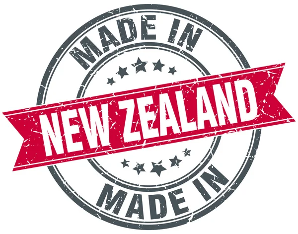 W Nowej Zelandii czerwony okrągły vintage pieczęć — Wektor stockowy