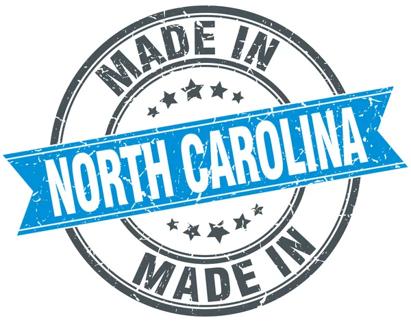 Fatto in North Carolina blu rotondo timbro vintage — Vettoriale Stock