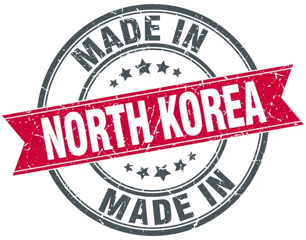 Fabricado na Coreia do Norte carimbo vintage redondo vermelho — Vetor de Stock